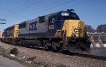 CSX 8512 brings a grain train eastbound past the Reusens hydro dam